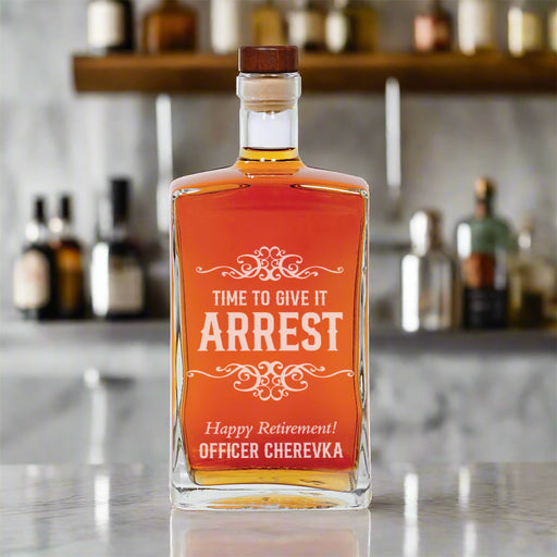 Personalized whiskey decanter gift for retired police officer sitting on a bar