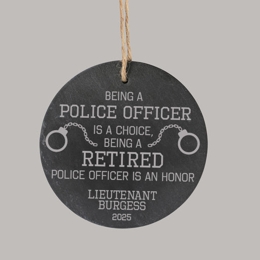 Round slate ornament with engraved police retirement message 