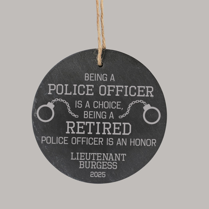 Round slate ornament with engraved police retirement message 
