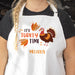Person wearing a personalized Thanksgiving apron with 'It's Turkey Time' text and turkey design.