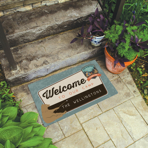 custom family camp welcome doormat with a bear smoking a marshmallow