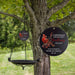 cardinal memorial bird bath with loved ones name and years of life hanging from a tree with a close up of the sail design
