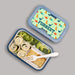Bento box with dinosaur pattern lid labeled 'Forrest' on a gray background