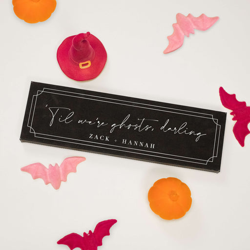til we're ghosts darling engraved on a black and silver vegan leather sign personalized with couples names