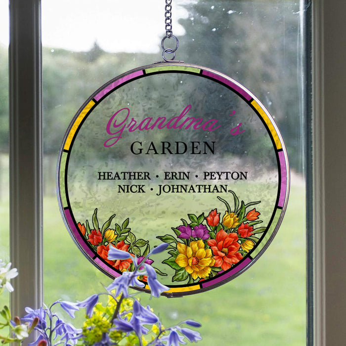 decorative round acrylic suncatcher for grandma on window with a purple flower