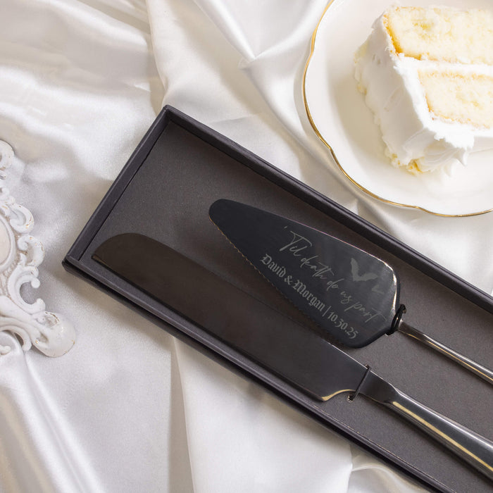 Two personalized black cake knives with in a black gift box for a gothic wedding