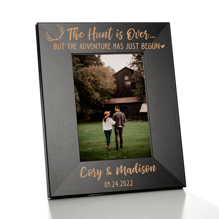 Custom the hunt is over engagement picture frame personalized with couples names and dates.
