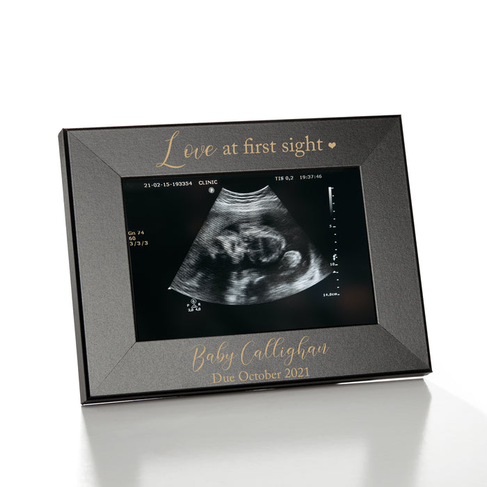 Personalized horizontal sonogram picture frame keepsake. The frame reads Love at first sight and is personalized with a name and due date.